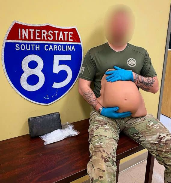 PHOTO: Account from Anderson County Sheriff’s Office: Deputies found a suspect trying to disguise drugs in the most unusual way. A woman was “carrying” a large amount of cocaine taped behind this rubber pregnancy belly. (Anderson County Sheriff's Office SC)