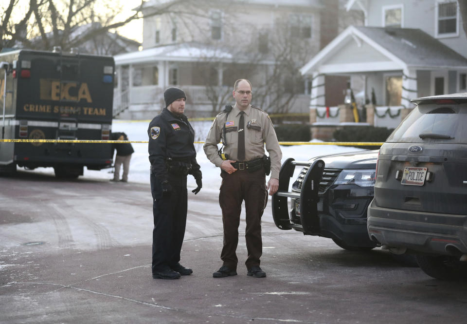 Law enforcement officers work at the scene of a shooting in Waseca, Minn., on Tuesday, Jan. 7, 2019. A Waseca police officer and a suspect were shot Monday night after reports of a disturbance in a residential neighborhood, according to the Minnesota Bureau of Criminal Apprehension. (David Joles/Star Tribune via AP)