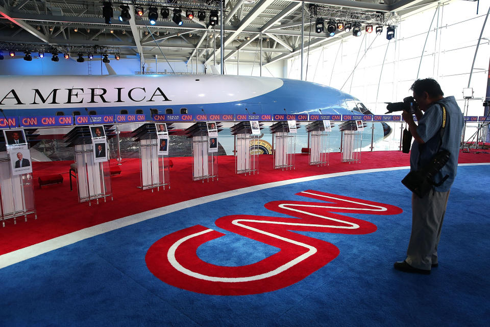 A photographer takes a picture of the stage before the start of the CNN Republican Presidential Debate at the Ronald Reagan Presidential Foundation and Library on Sept. 16, 2015, in Simi Valley, California. Republican presidential candidates are set to square off in the CNN Republican Presidential Debate.