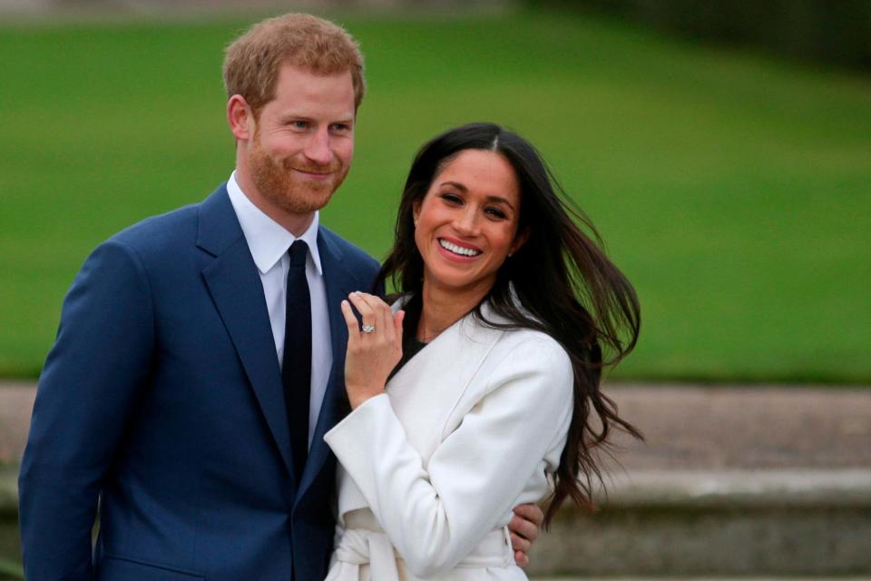 Prince Harry and Meghan (AFP via Getty Images)