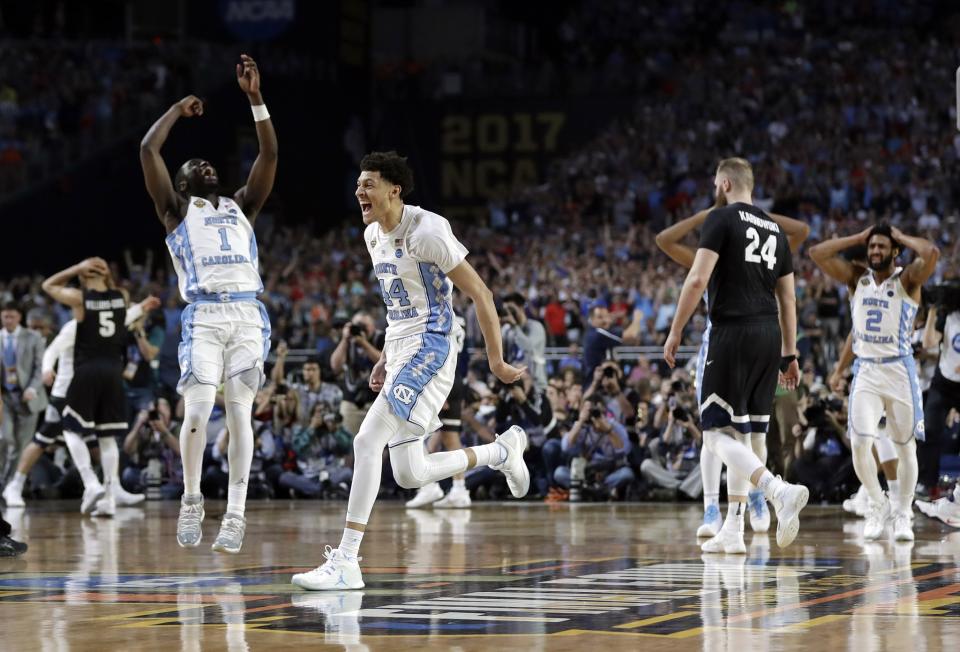 <p>North Carolina players celebrate after the finals of the Final Four NCAA college basketball tournament against Gonzaga, Monday, April 3, 2017, in Glendale, Ariz. North Carolina won 71-65. (AP Photo/David J. Phillip) </p>