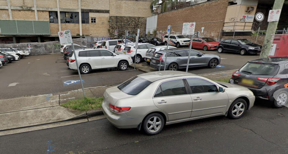 An older image from Google Maps reveals the original signs in place stating that drivers could park within the bay between the hours of 8am and 10pm. Source: Google Maps