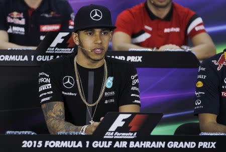 Mercedes Formula One driver Lewis Hamilton of Britain speaks during a drivers' news conference ahead of Bahrain's F1 Grand Prix at Bahrain International Circuit south of Manama, April 16, 2015. REUTERS/Hamad I Mohammed