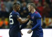 Football Soccer - Ajax Amsterdam v Manchester United - UEFA Europa League Final - Friends Arena, Solna, Stockholm, Sweden - 24/5/17 Manchester United's Antonio Valencia puts the captains armband on Wayne Rooney as he comes on as a substitute Reuters / Andrew Couldridge Livepic