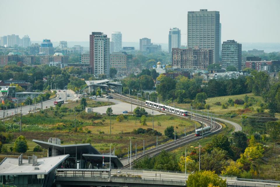 The Confederation Line light rail system in Ottawa between Pimisi station, bottom, and Bayview station in late September 2023.