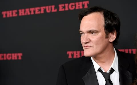 Quentin Tarantino arrives at the Los Angeles premiere of "The Hateful Eight" at the Cinerama Dome on Monday, Dec. 7, 2015 - Credit: AP