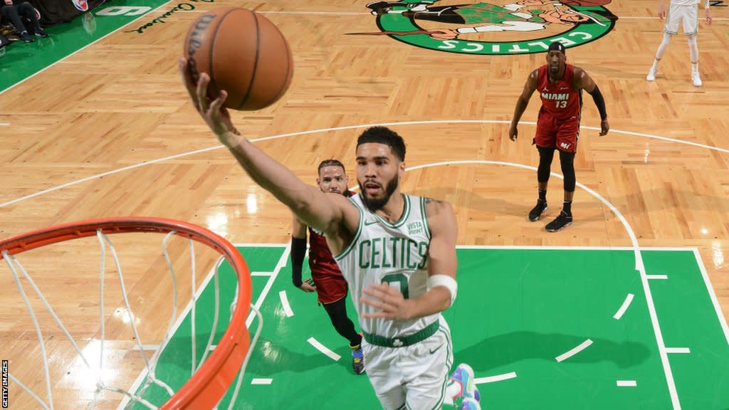 Jayson Tatum of the Boston Celtics drives to the basket during the game against the Miami Heat in the 2024 NBA Playoffs
