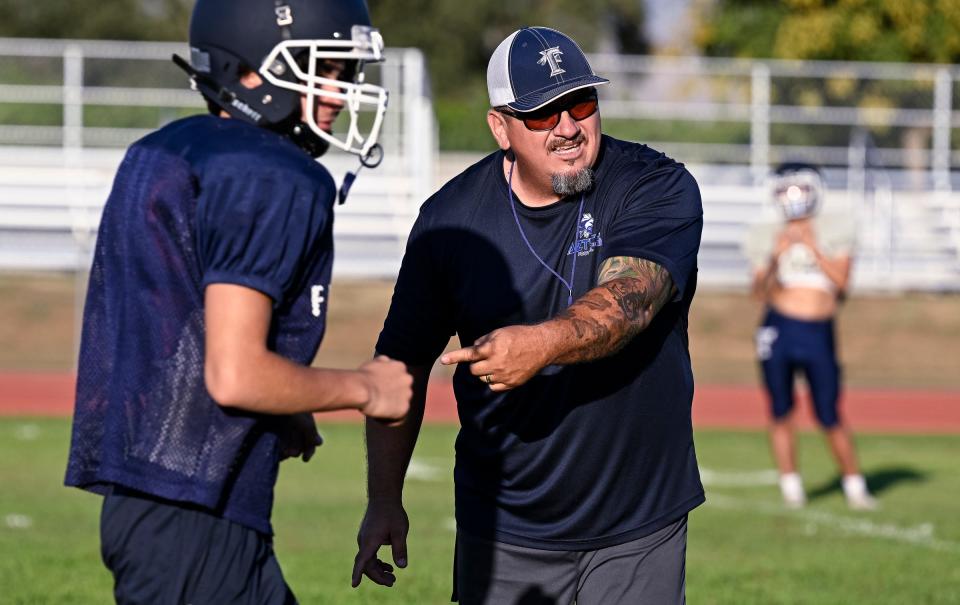 Bryan Rojas works with his team on Friday, July 28, 2023. Rojas is the new Head Football Coach for Farmersville High School.
