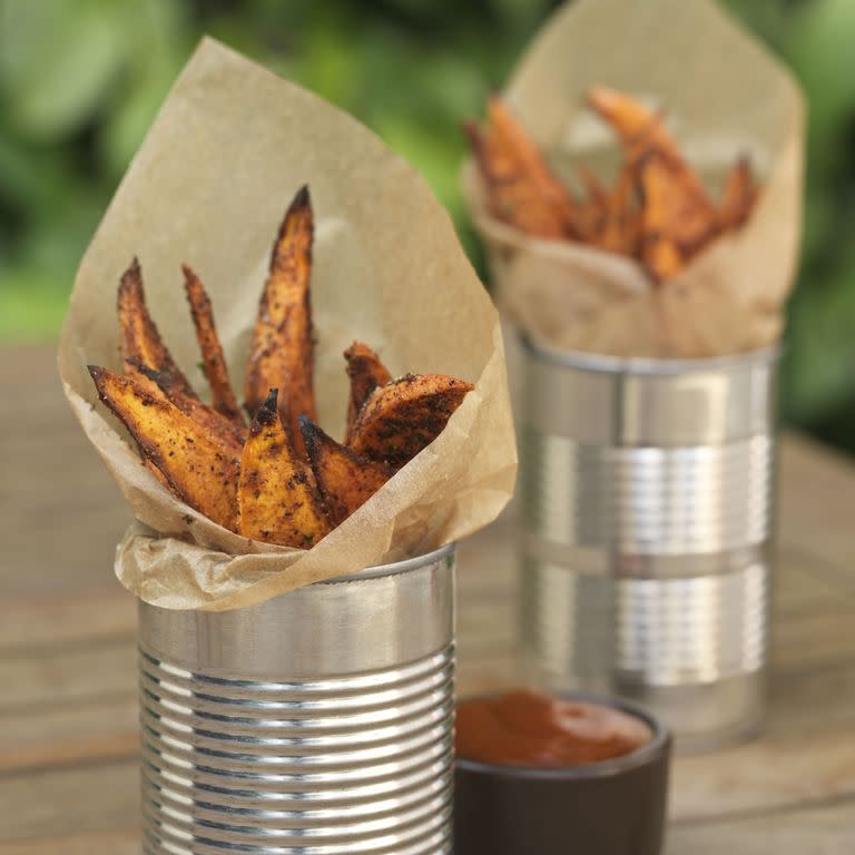 <p>Sweet potato fries go with almost any dish and are perfect if you have children who refuse to eat vegetables but love fries. <br></p><p><em><a href="https://www.womansday.com/food-recipes/food-drinks/recipes/a40172/oven-baked-sweet-potato-fries-3483/" rel="nofollow noopener" target="_blank" data-ylk="slk:Get the recipe for Oven-Baked Sweet Potato Fries.;elm:context_link;itc:0;sec:content-canvas" class="link ">Get the recipe for Oven-Baked Sweet Potato Fries.</a></em></p>