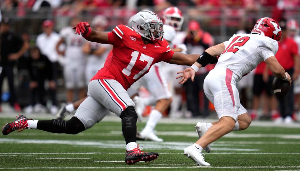 Ohio State linebacker Mitchell Melton pursues Youngstown State quarterback Beau Brungard.