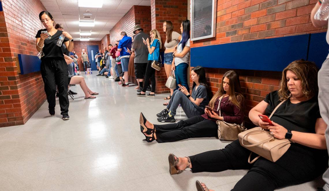 Voters wait in a very long line at the Linwood Recreation Center just before polls closed at 7 p.m. in August.