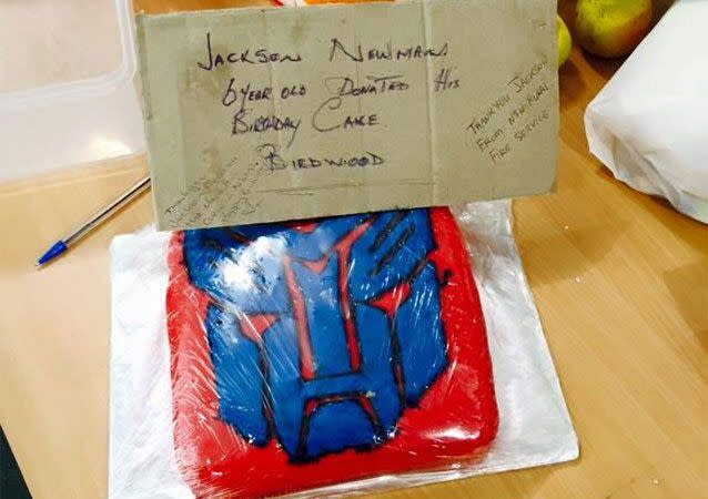 Jackson Newman donated his birthday cake to weary firefighters. Photo: Facebook, Horsley Park Rural Fire Brigade.