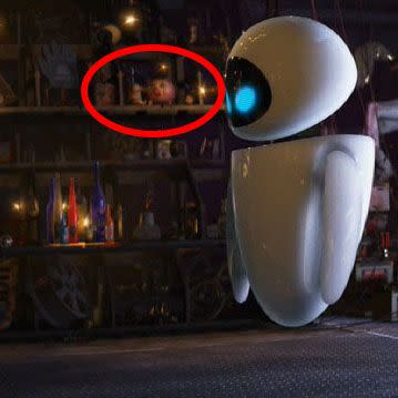 <p>There's room for lots of hidden references among Wall-E's junk, but our favorite is a brief cameo by <em>Toy Story</em>'s Hamm — it's on the shelf behind Eve. The voice of Hamm is provided by <a href="https://www.imdb.com/name/nm0001652/" rel="nofollow noopener" target="_blank" data-ylk="slk:John Ratzenberger;elm:context_link;itc:0;sec:content-canvas" class="link ">John Ratzenberger</a>, who is often considered an Easter egg in his own right, because Pixar has found a way to <a href="https://ratzenberger.com/pixar-characters/" rel="nofollow noopener" target="_blank" data-ylk="slk:slip his voice into every single one of their movies;elm:context_link;itc:0;sec:content-canvas" class="link ">slip his voice into every single one of their movies</a>. (He only says one word in <em>Coco</em>: "Gracias.")</p>