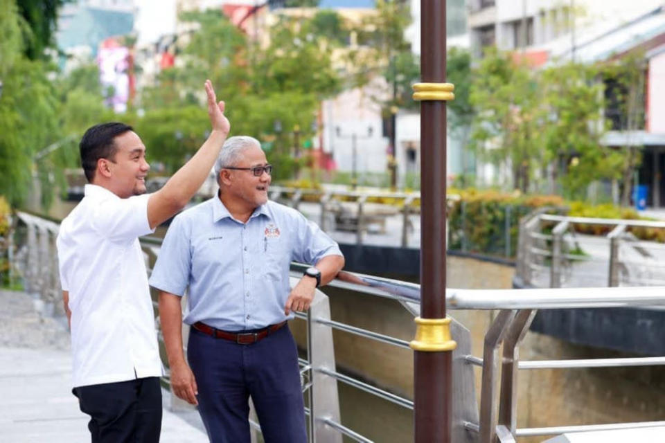 Johor Mentri Besar Datuk Onn Hafiz Ghazi and Johor Baru Mayor Datuk Mohd Noorazam Osman during his visit to the Sungai Segget area of the Johor Baru city centre, May 11, 2022. &#x002014; Picture courtesy of Facebook/Onn Hafiz