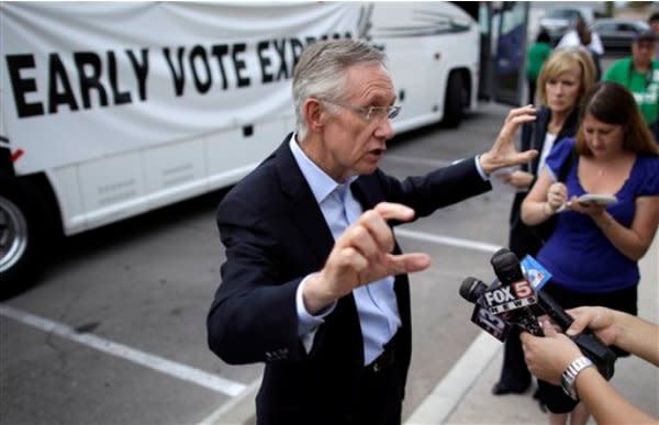 Harry Reid speaks to reporters.