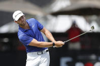 Matthew Wolff hits his second shot at the 11th green during the third round of the Rocket Mortgage Classic golf tournament, Saturday, July 4, 2020, at the Detroit Golf Club in Detroit. (AP Photo/Carlos Osorio)