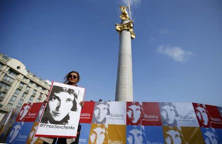 A woman attends a rally demanding the liberation of Ukrainian army pilot Nadezhda Savchenko by Russia, at the Freedom Square in Tbilisi, Georgia, March 9, 2016. REUTERS/David Mdzinarishvili