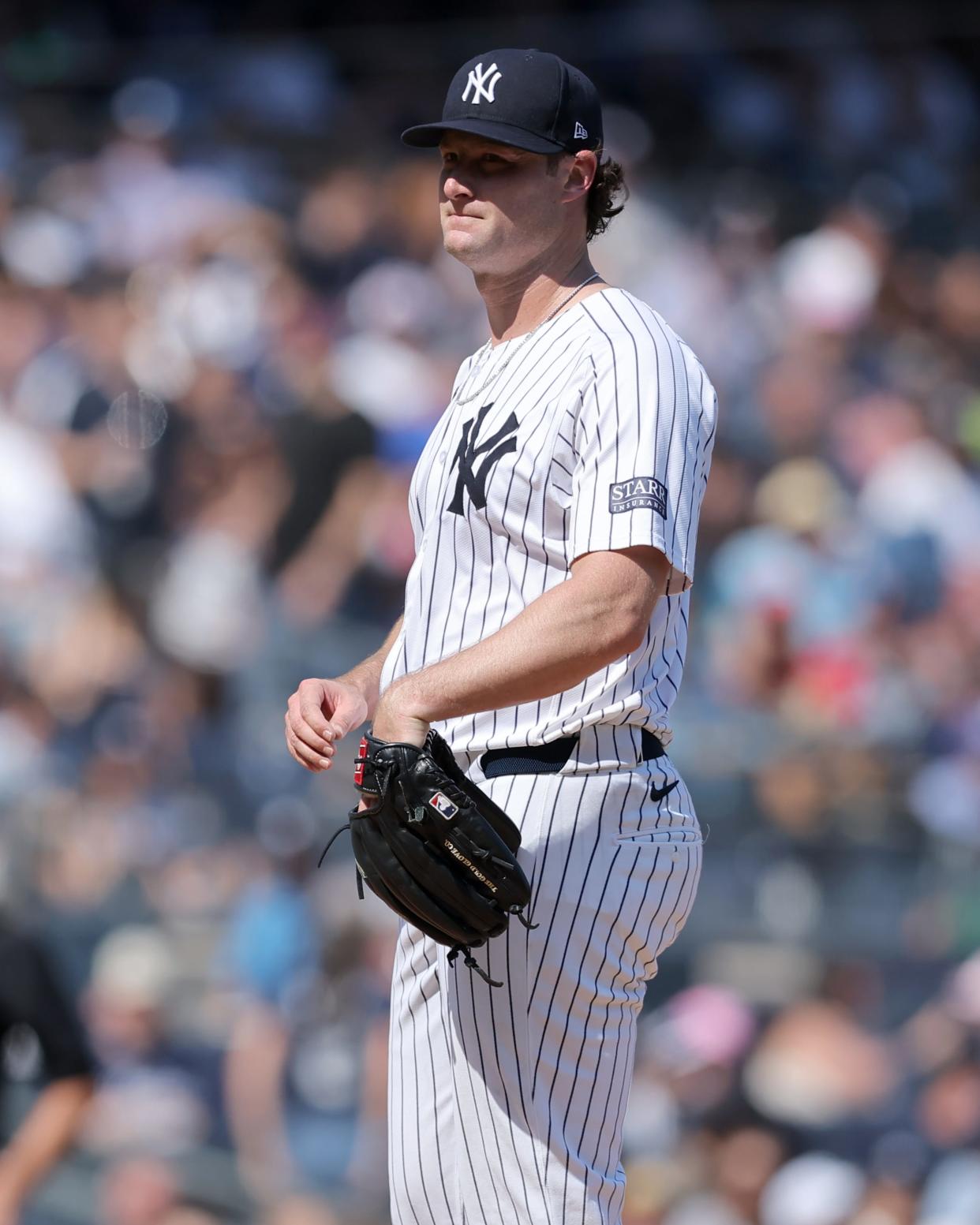 Sep 14, 2024; Bronx, New York, USA; New York Yankees starting pitcher Gerrit Cole (45) reacts during the fifth inning against the Boston Red Sox at Yankee Stadium. Mandatory Credit: Brad Penner-Imagn Images