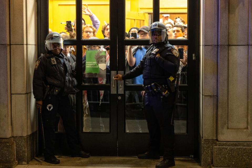NYPD officers preparing to enter Columbia’s Hamilton Hall on April 30, 2024. Photo by Michael M. Santiago/Getty Images