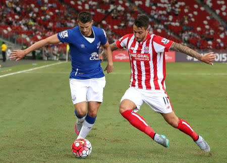 Football - Everton v Stoke City - Barclays Asia Trophy - National Stadium, Singapore - 15/7/15 Everton's Kevin Mirallas in action with Stoke City's Joselu Mandatory Credit: Action Images / Jeremy Lee Livepic