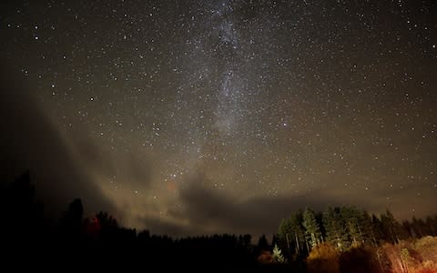 Stars in the Milky Way over Kielder Forest - Credit: Owen Humphreys