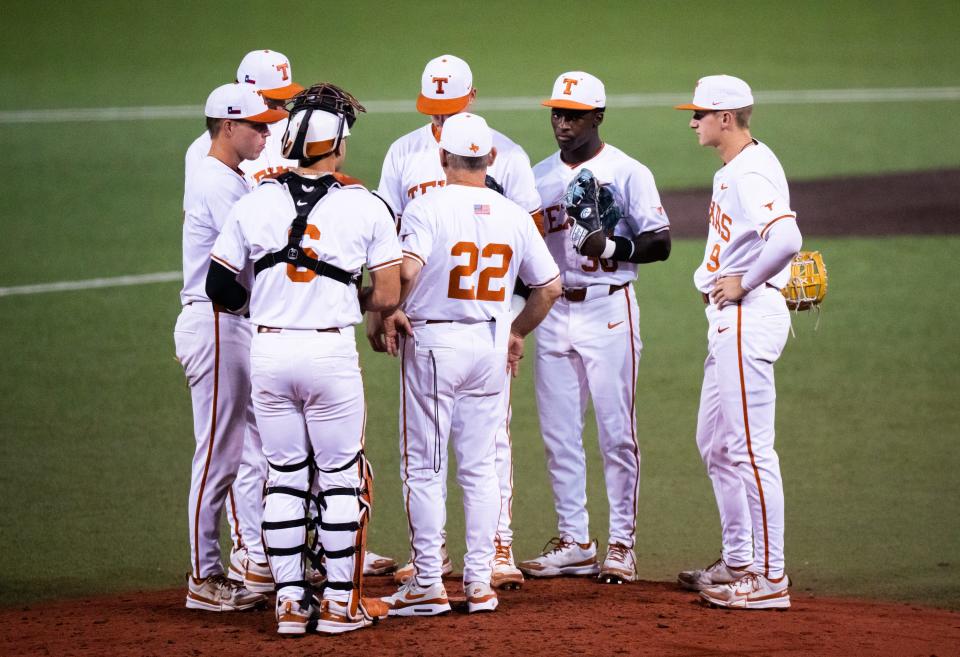 Texas players gather around head coach David Pierce during the sixth inning. Pitching has been a season-long problem for the Longhorns, who had seen their projected ace, Lebarron Johnson Jr., struggle in his Friday night role and their projected Sunday starter, Tanner Witt, also struggle as he tries to return from Tommy John surgery.