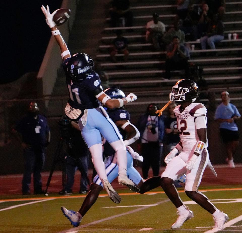 Terrance Hall (11) of Chapin High School, attempts to intercept a pass during their game against Andress High School on Sept. 20, 2024.