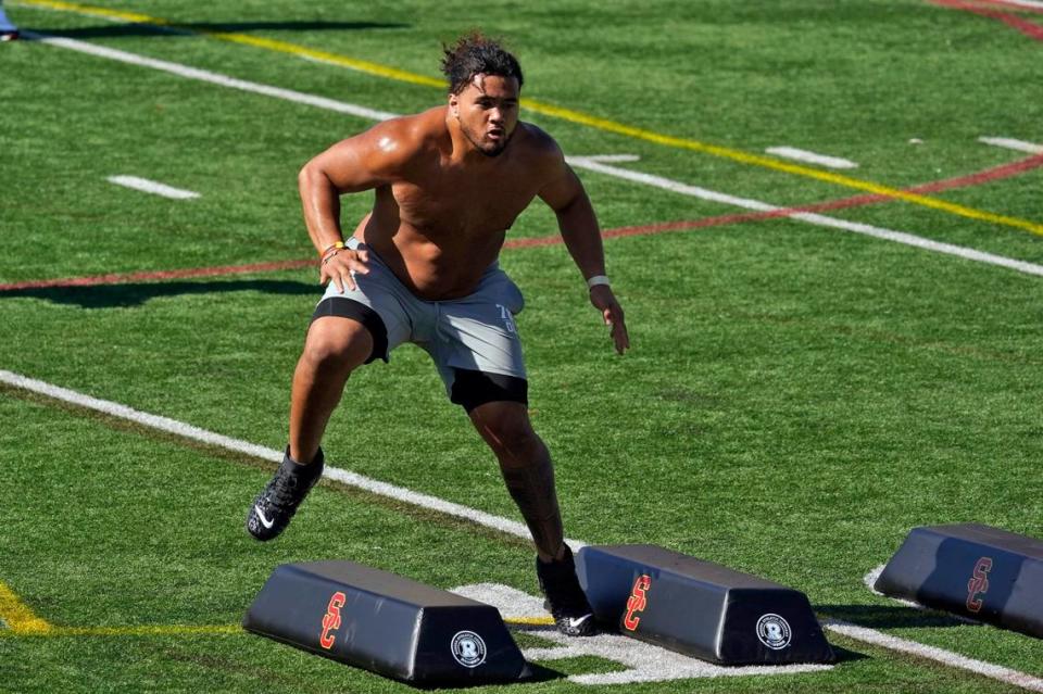 Southern California defensive tackle Jay Tufele participates in the school’s pro day football workout for NFL scouts Wednesday, March 24, 2021, in Los Angeles. (AP Photo/Marcio Jose Sanchez)