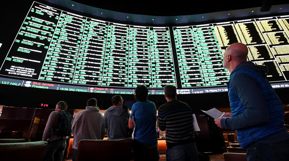 MLB says it will support gambling legislation but wants to protect the integrity of the game. (AP)
