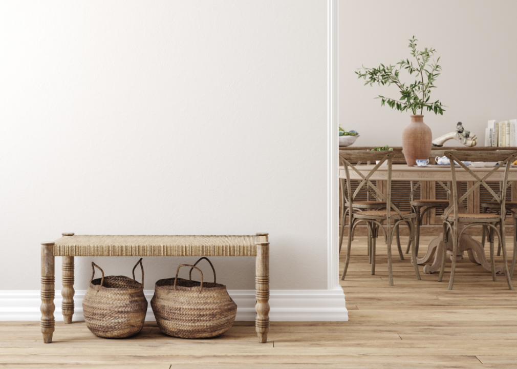 A living room with beige walls and muted color furniture