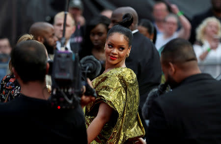 Rihanna launches luxury fashion label Fenty in Paris