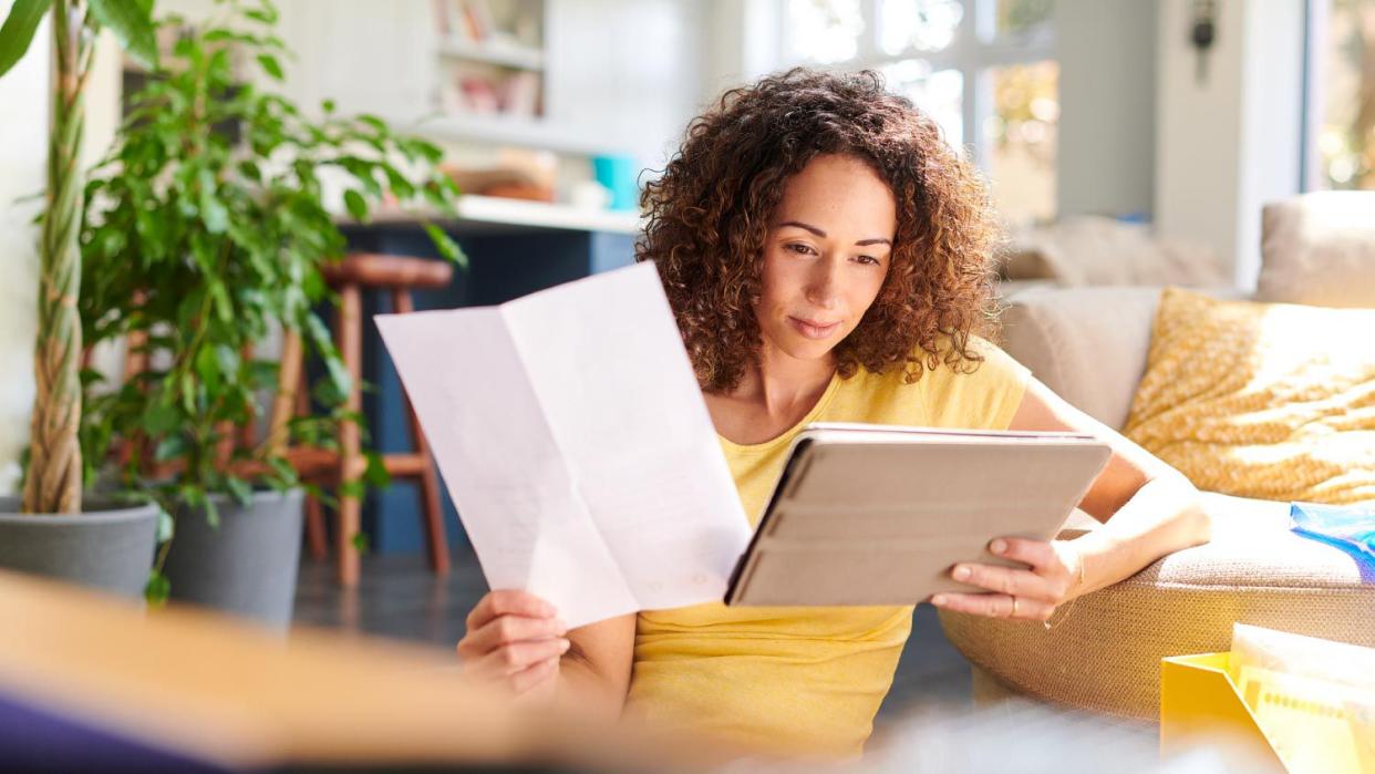 Woman checking her home finances online