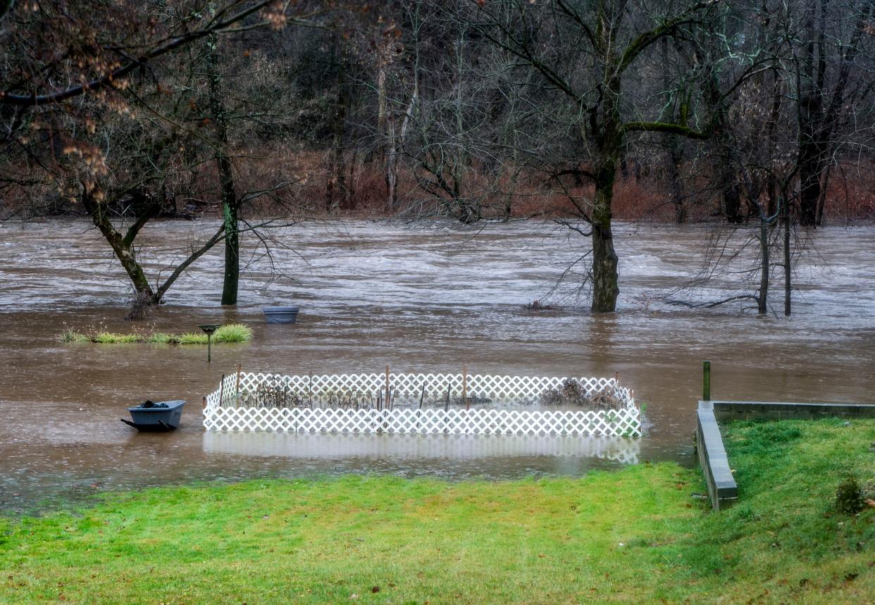 The Neshaminy Creek floods backyards along Main St. due to the most recent rain storm in Hulmeville on Monday, Dec. 18, 2023.

Daniella Heminghaus | Bucks County Courier Times