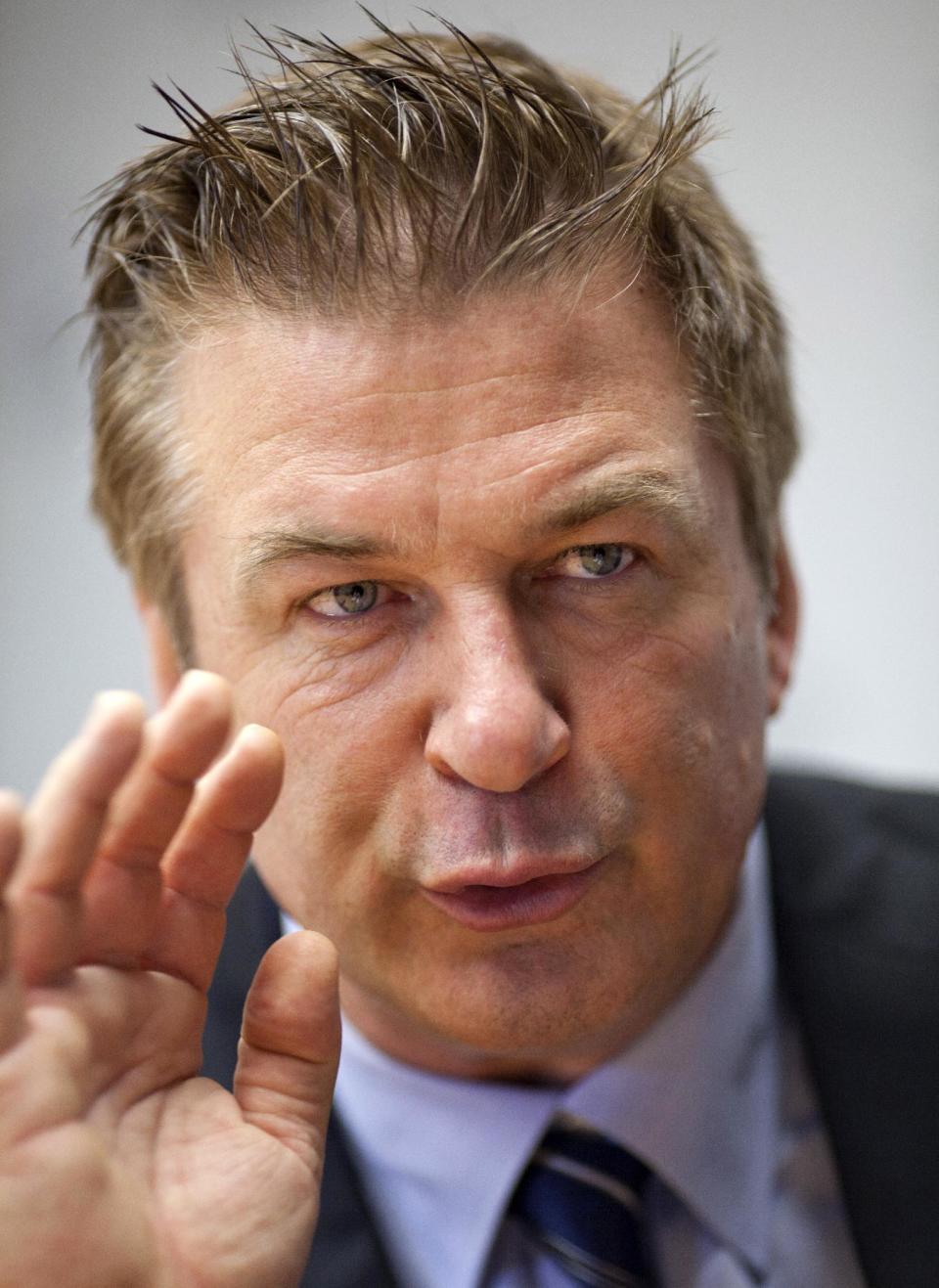 Alec Baldwin gestures during an interview with The Associated Press in Washington, Monday, April 16, 2012, Alec Baldwin is going to Congress to ask for sustained federal funding for arts programs amid the ever tight budget climate. Baldwin and Folds talk with AP ahead of their visits to congressional offices on Tuesday. (AP Photo/J. Scott Applewhite)