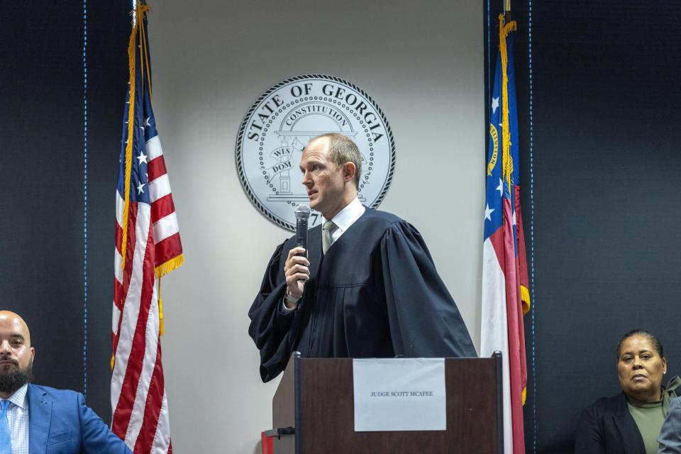 Fulton Superior Court Judge Scott McAfee addresses potential jurors during jury selection for lawyer Kenneth Chesebro's trial, Friday, Oct. 20, 2023, at the Fulton County Courthouse in Atlanta. Jury selection began Friday for Chesebro, the first defendant to go to trial in the Georgia case that accuses former President Donald Trump and others of illegally scheming to overturn the 2020 election in the state. (Alyssa Pointer/Pool Photo via AP)