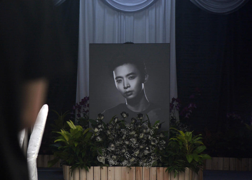 A photograph of Singapore actor Aloysius Pang is displayed at his public memorial in Singapore Saturday, Jan. 26, 2019. Pang died from injuries sustained during a military training exercise in New Zealand on Thursday. (AP Photo/Annabelle Liang)