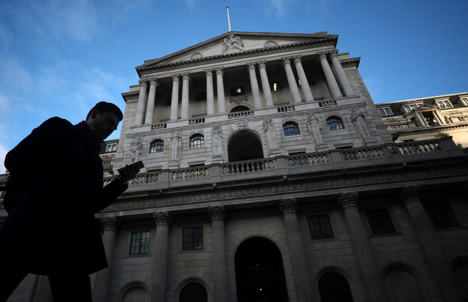 A man walks past the Bank of England in the City of London, Britain, February 7, 2019. REUTERS/Hannah McKay