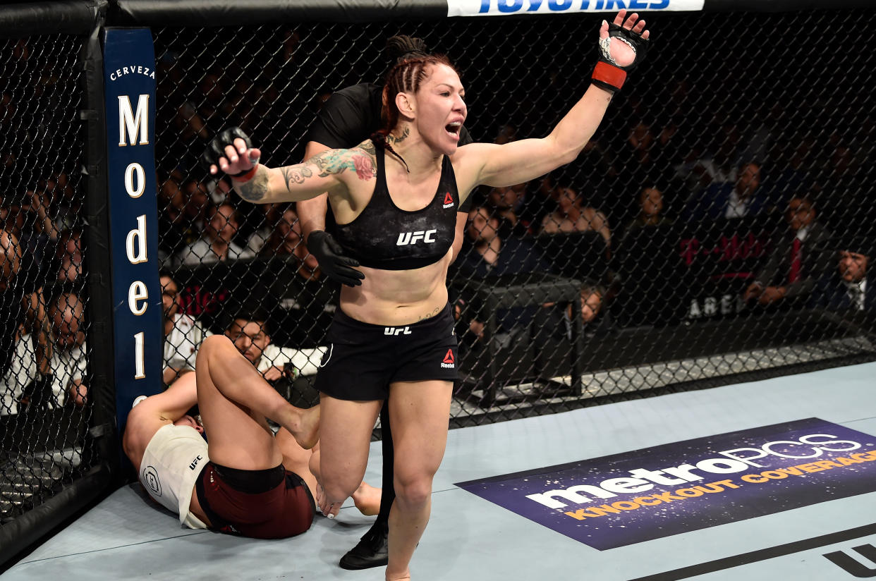 Cris Cyborg celebrates after her TKO victory over Yana Kunitskaya in their women’s featherweight bout during the UFC 222 event inside T-Mobile Arena on March 3, 2018 in Las Vegas, Nevada. (Getty Images)