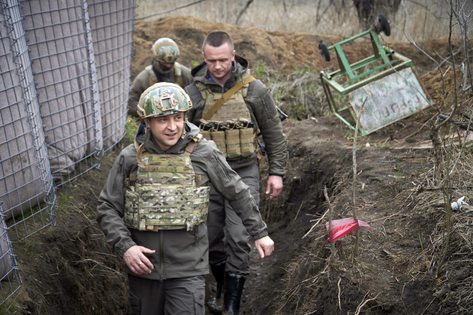 Ukrainian President Volodymyr Zelenskyy visits the war-hit Donbas region, eastern Ukraine, Friday, April 9, 2021. Ukraine's president is visiting the area of conflict in his country's east amid an escalation of tensions that has raised fears of a resumption of large-scale hostilities. (Ukrainian Presidential Press Office via AP)