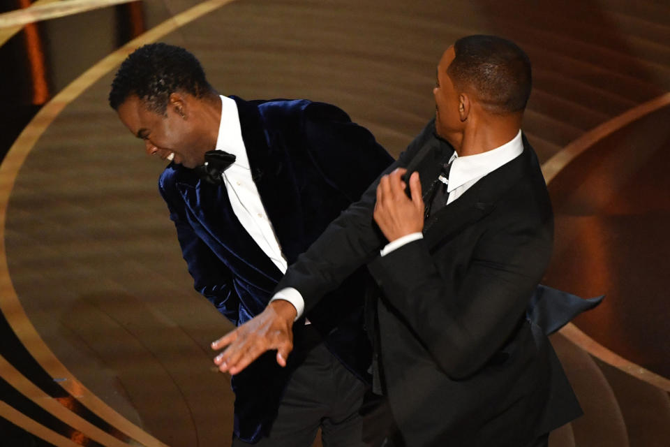 Image: Will Smith slaps Chris Rock during the Oscars in Hollywood, Calif.,  on March 27, 2022. (Robyn Beck / AFP via Getty Images file)