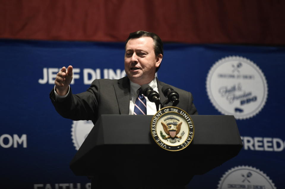 South Carolina Republican Party Chairman Drew McKissick welcomes people to U.S. Rep. Jeff Duncan's annual fundraiser, Monday, Aug. 26, 2019, in Anderson, S.C. (AP Photo/Meg Kinnard)