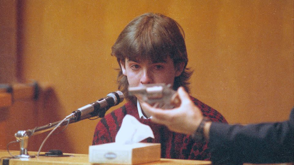 William Flynn, 17, is shown the gun he used at Pamela Smart's trial on March 12, 1991. Flynn told jurors how he, with the help of his girlfriend Smart, killed her husband. - Jim Cole/AP