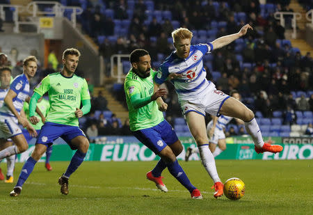 Soccer Football - Championship - Reading vs Cardiff City - Madejski Stadium, Reading, Britain - December 11, 2017 Reading's Paul McShane in action with Cardiff City's Liam Feeney Action Images/Paul Childs