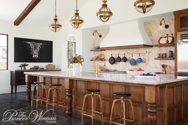 <p>Buff Strickland/The Pioneer Woman Magazine</p> Ree Drummond's kitchen, outfitted with a marble-topped island