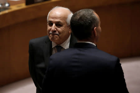 Palestinian Ambassador to the United Nations Riyad Mansour (L) stops to chat with Nickolay Mladenov, U.N. Special Coordinator for the Middle East Peace Process and Personal Representative of the Secretary-General, before a U.N. Security Council meeting on the situation in the Middle East at U.N. headquarters in New York City, New York, U.S., March 24, 2017. REUTERS/Mike Segar