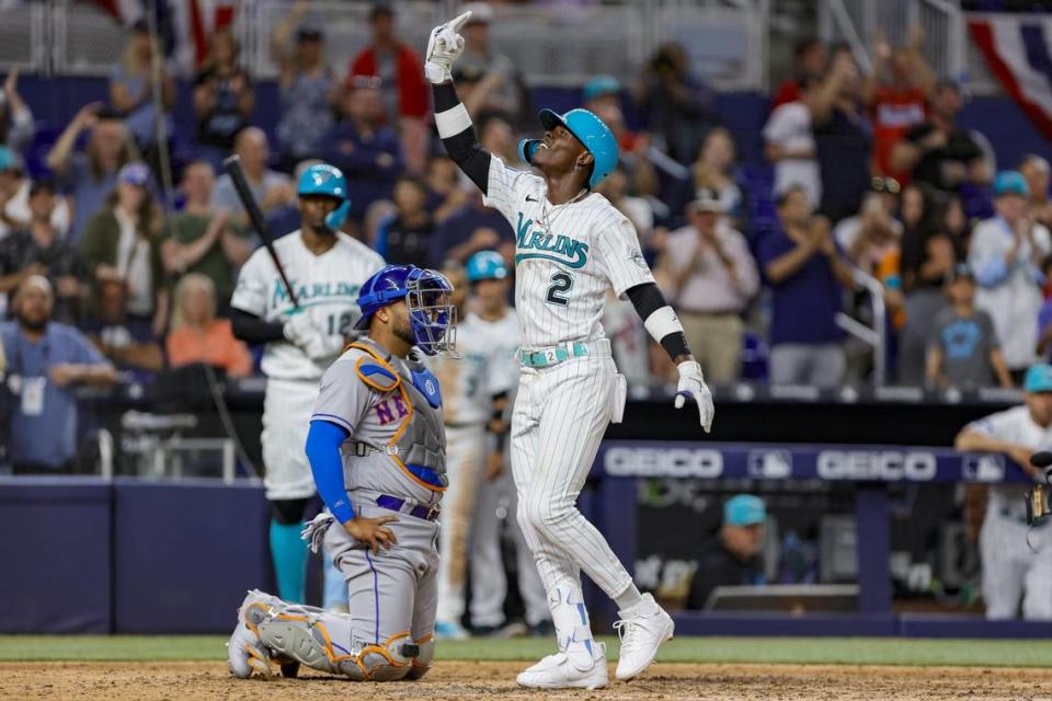 Miami Marlins center fielder Jazz Chisholm Jr. (2) reacts at home plate after hitting a home run during the eighth inning against the New York Mets at loanDepot park on Friday, March 31, 2023. Sam Navarro/USA TODAY NETWORK