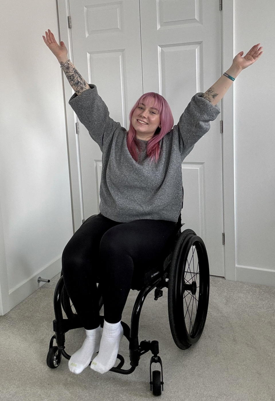 Emily sometimes has to use a wheelchair as her condition causes bouts of paralysis. (Emily Newman/SWNS)