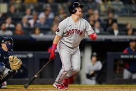 Boston Red Sox's Reese McGuire follows through on a three-run home run during the seventh inning of a baseball game against the New York Yankees Thursday, Sept. 22, 2022, in New York. (AP Photo/Frank Franklin II)