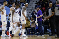 Washington Wizards forward Taj Gibson (67) argues that he was fouled by New Orleans Pelicans center Jonas Valanciunas before Valanciunas was ejected in the first half of an NBA basketball game in New Orleans, Saturday, Jan. 28, 2023. (AP Photo/Matthew Hinton)