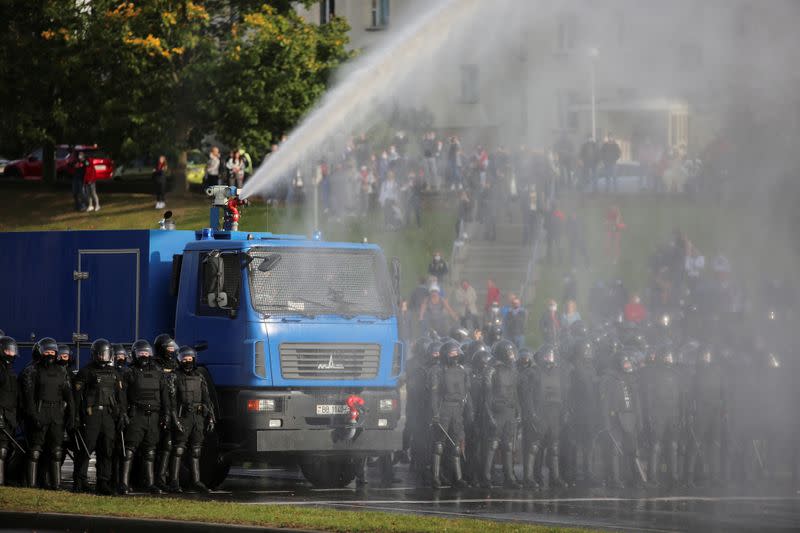 Belarusian opposition supporters hold a rally in Minsk